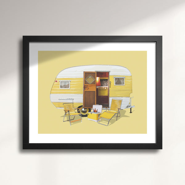 Framed artwork of a vintage 1956 Jewel Camping Trailer with outdoor furniture on a yellow background