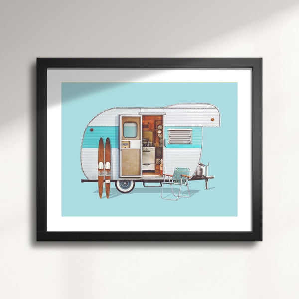 Framed artwork of a vintage 1963 Yellowstone Camping Trailer with surfboards on a light blue background