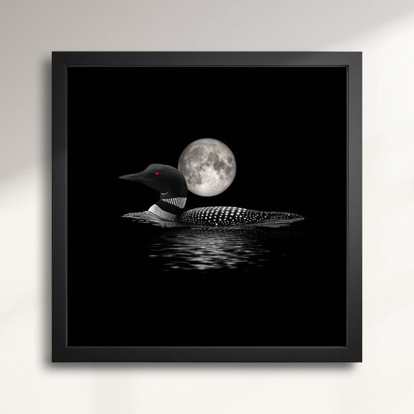 Framed artwork of a loon with a full moon in the background titled Lunar Loon