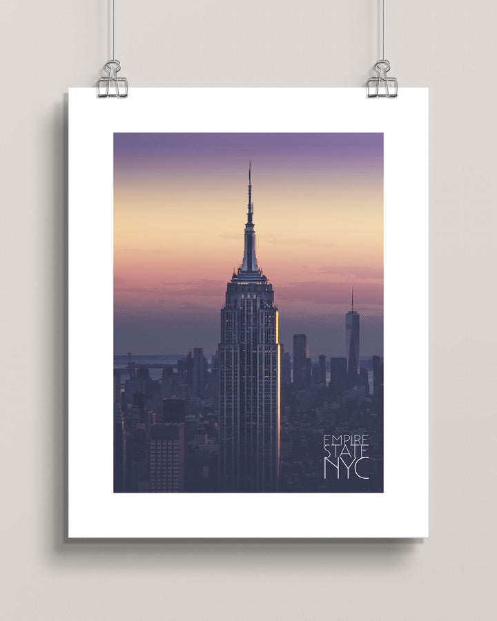 Hanging poster of the Empire State Building with a cityscape background