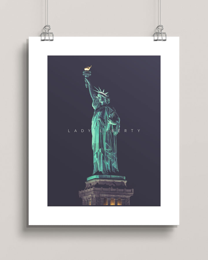 Hanging artwork of the Statue of Liberty on a dark background titled Lady Liberty at Night