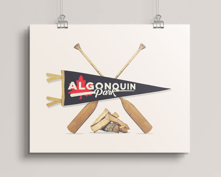 poster artwork with Algonquin Park pennant and paddles on a beige background